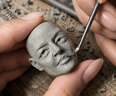 SCULPTING WITH CLAY AND MOLDING